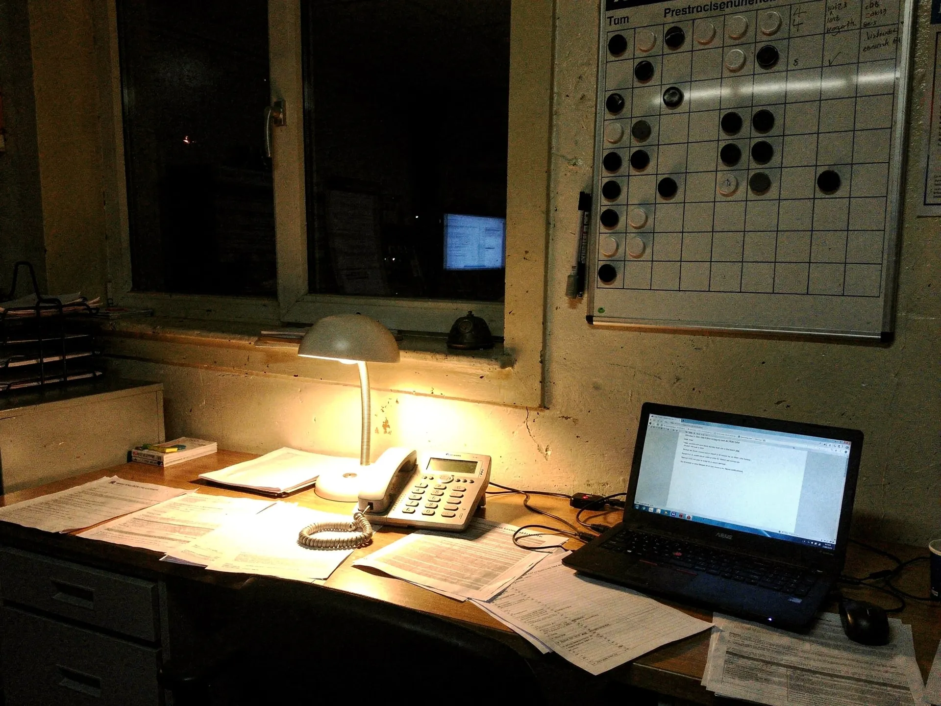 Office phone and laptop at a plumbing company